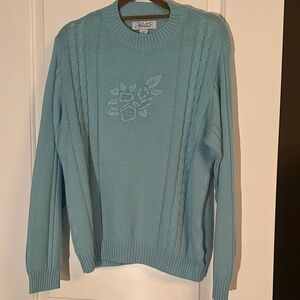 Vintage sweater with embroidered flowers.